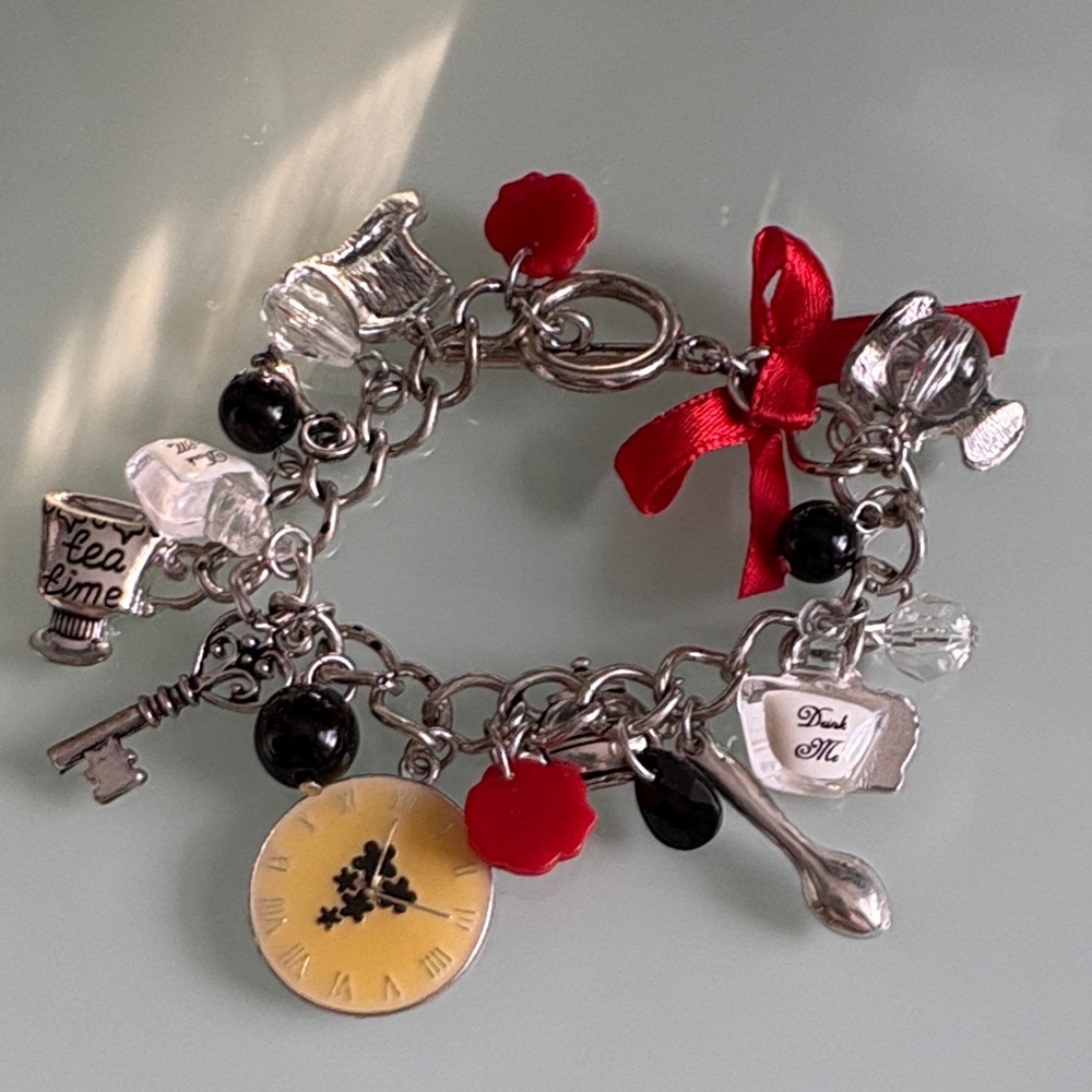 Charming Silver Bracelet with Red and Black Accents